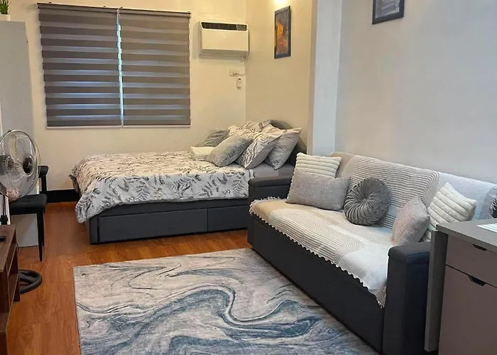 Kim's Cozy Place - Parthenon Residences Frühstückspension