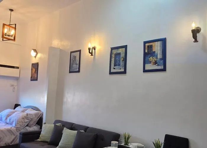 Kim's Cozy Place - Parthenon Residences Frühstückspension